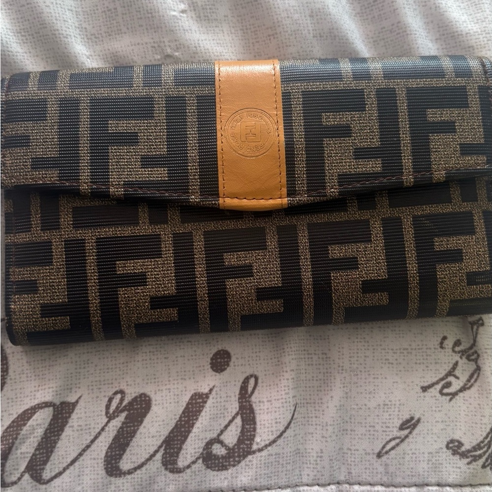 Fendi Black and Tan Wallet with check book folder.